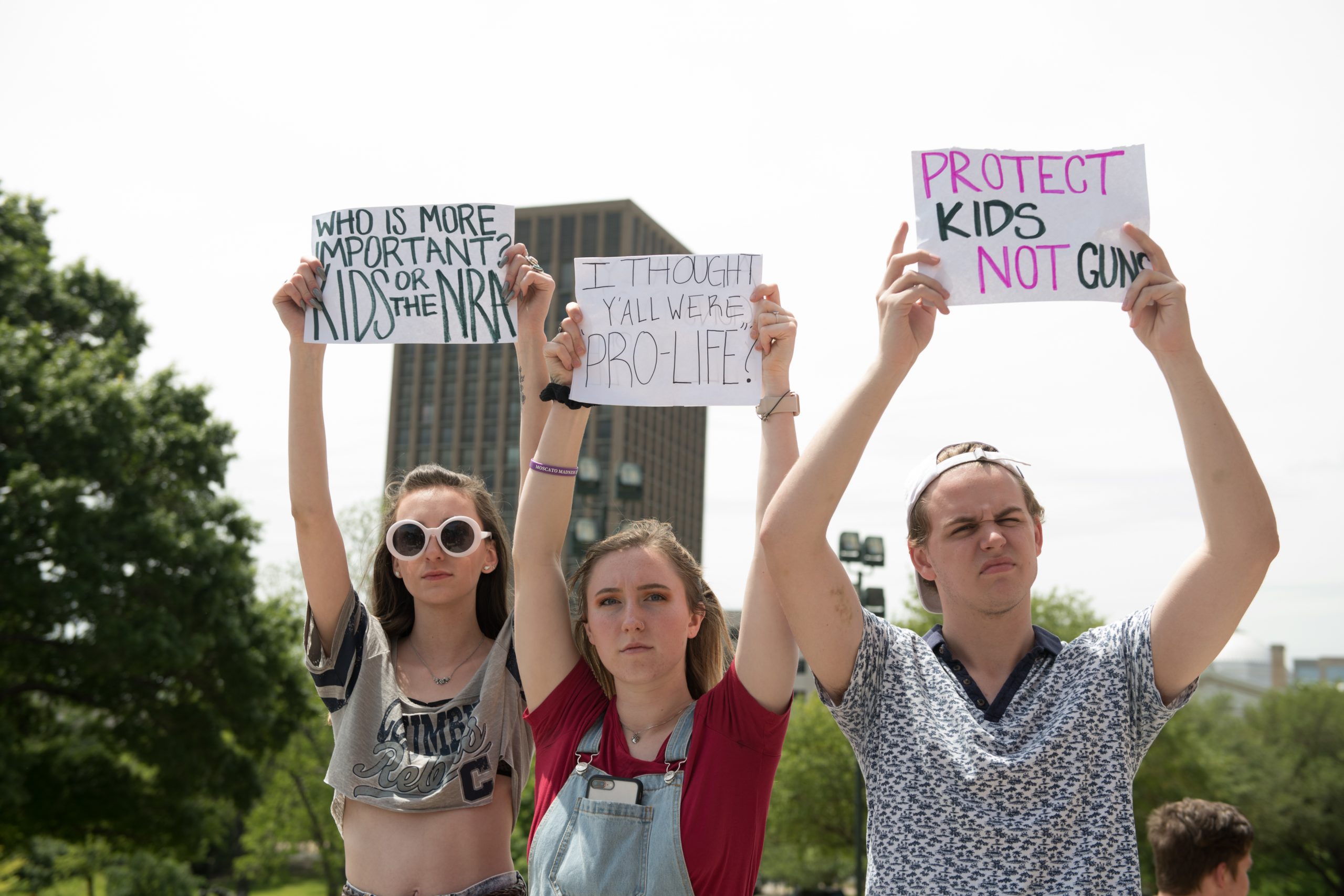 April 20, 2018 - Three students with a banners protesting gun violence join thousands of fellow students gathered at the Texas State Capitol in Austin on the 19th anniversary of the Columbine High School massacre. (Credit Image: © Sandy Carson via ZUMA Wire)